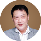 คุณสันทัด ศรีจารุพฤกษ