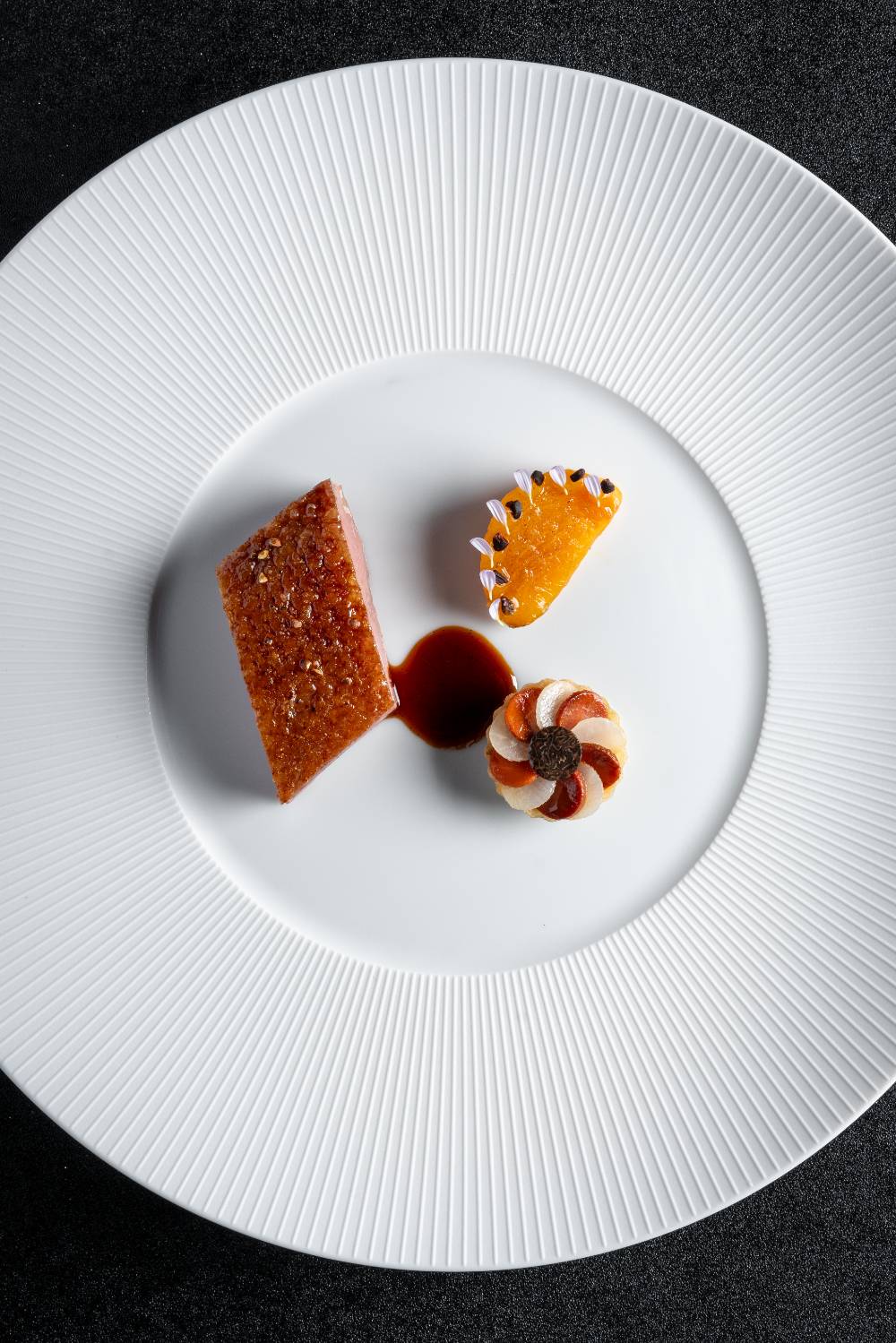 Duck aged for 10 days with Persimon, Crue de Cacao, Duck Leg, Liver and Vanilla Jus